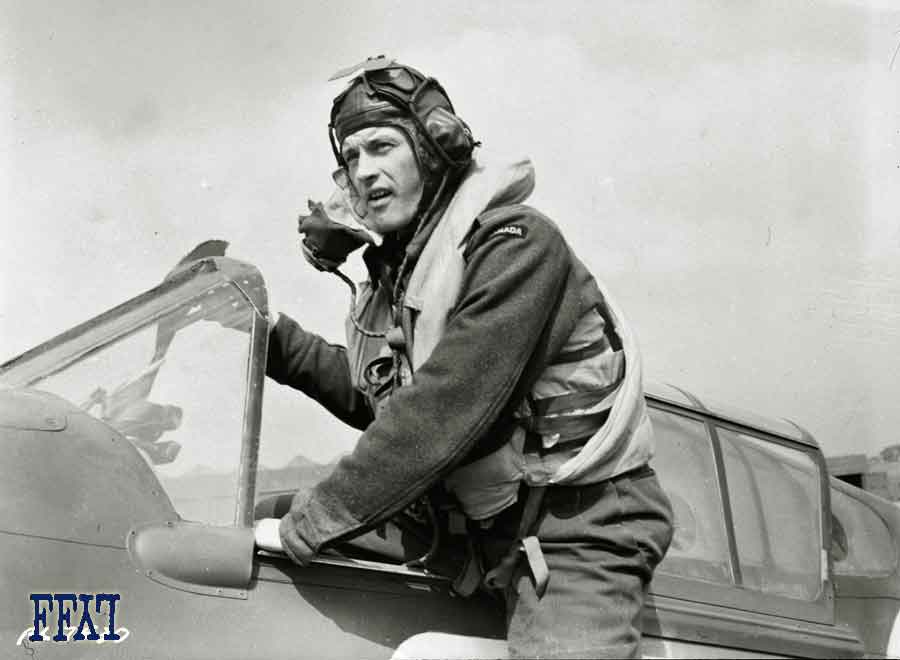 John Morton getting into his P-40